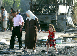 An Iraqi family trips the light fantastic in Basra.